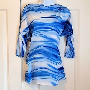 Mini dress or can be a long top